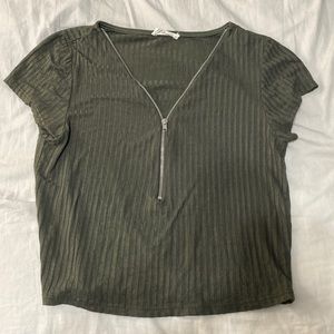 Green ribbed cotton tee shirt with silver zipper. Size small. Brand is poetry